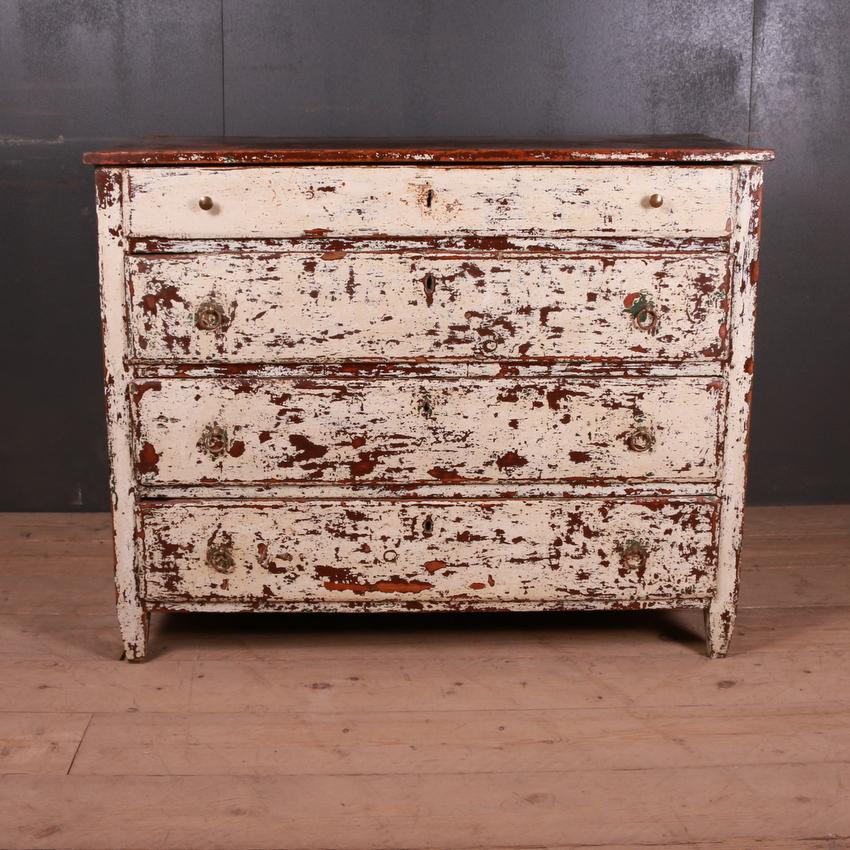 Early 19th century French empire original painted commode, 1820.

Dimensions:
45.5 inches (116 cms) wide
23.5 inches (60 cms) deep
36.5 inches (93 cms) high.