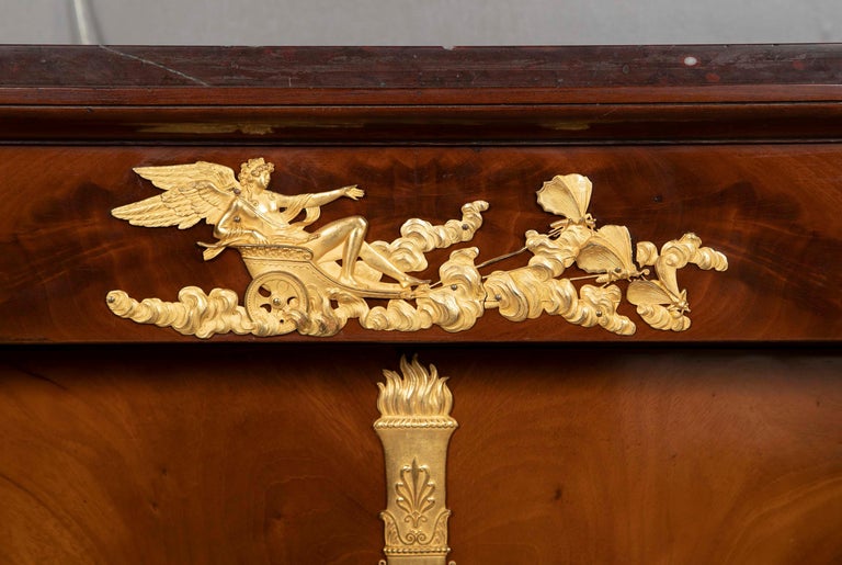 A Molitor French Empire Flame Mahogany and Gilt Bronze Commode with Rouge Griotte A Molitor French Empire Flame Mahogany and Gilt Bronze Commode with Rouge Griotte