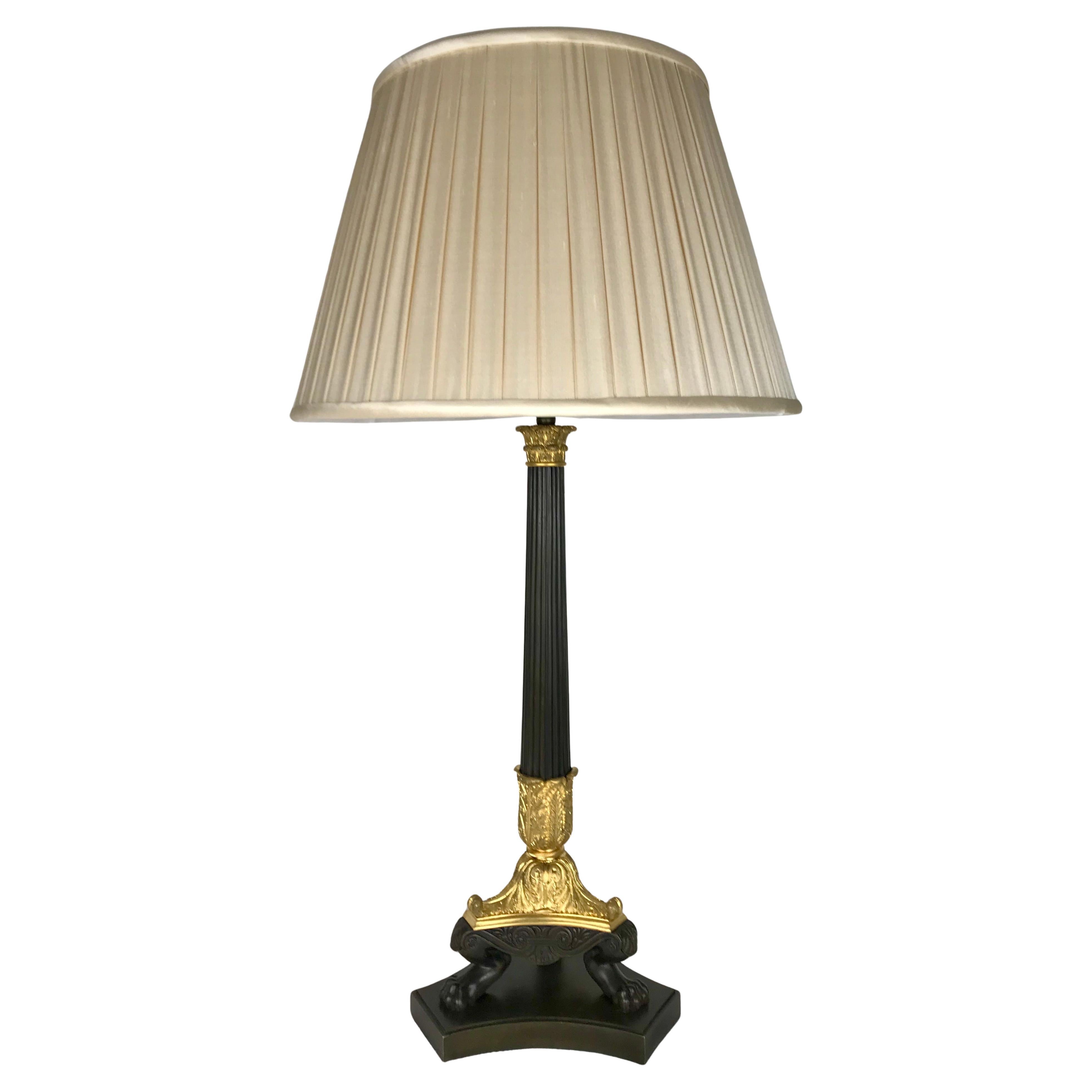 Französische Empire vergoldete und patinierte Bronze Säulenlampe