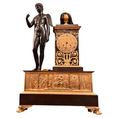 French Empire Gilt and Patinated Bronze Figurative Clock of Cupid and Eurydice
