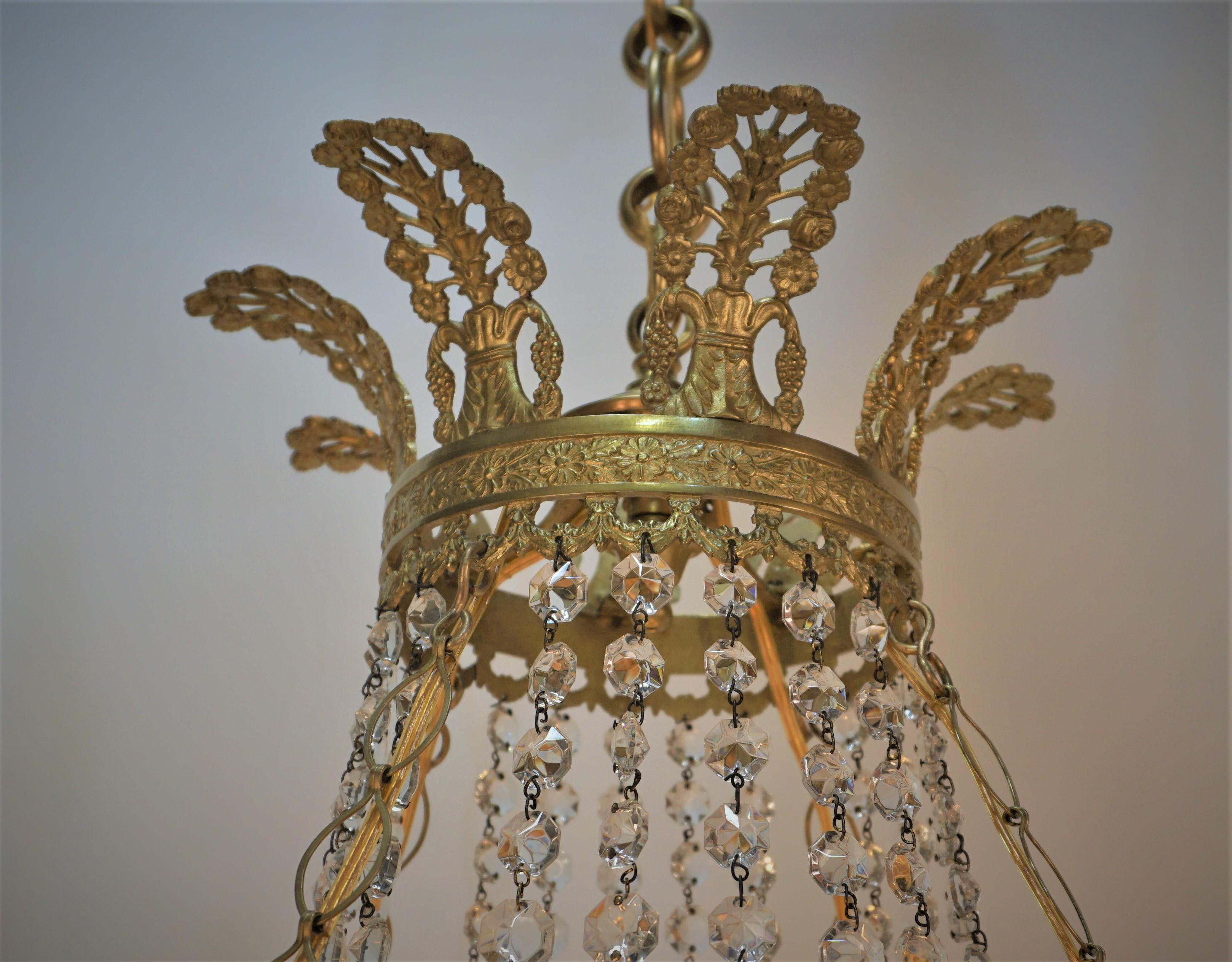 Early 20th Century French Empire Gilt Bronze and Crystal Chandelier For Sale