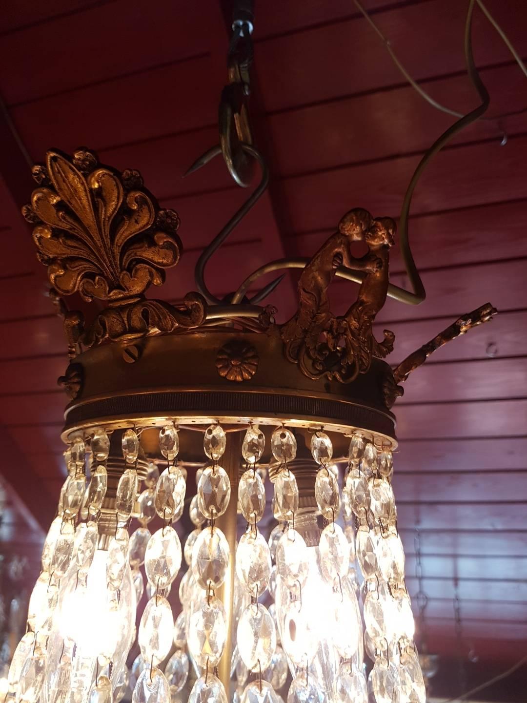 French Empire Gilt Bronze and Crystal Cut Dore Chandelier For Sale 4