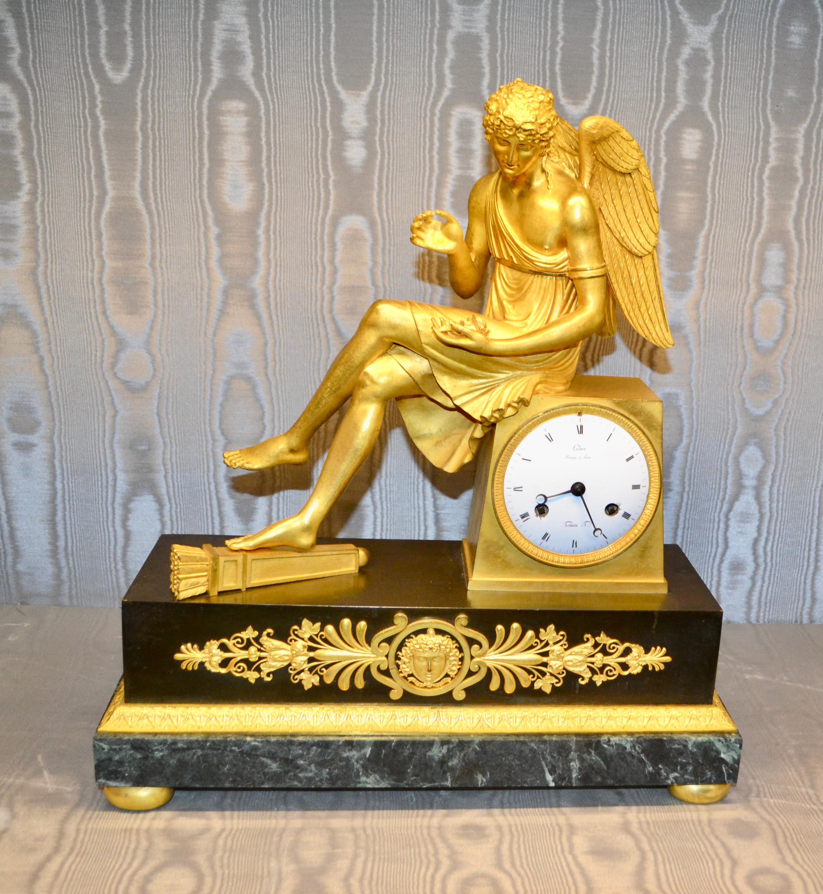 French Empire Gilt Bronze and Marble Clock of Seated Cupid Holding a Rose For Sale 8