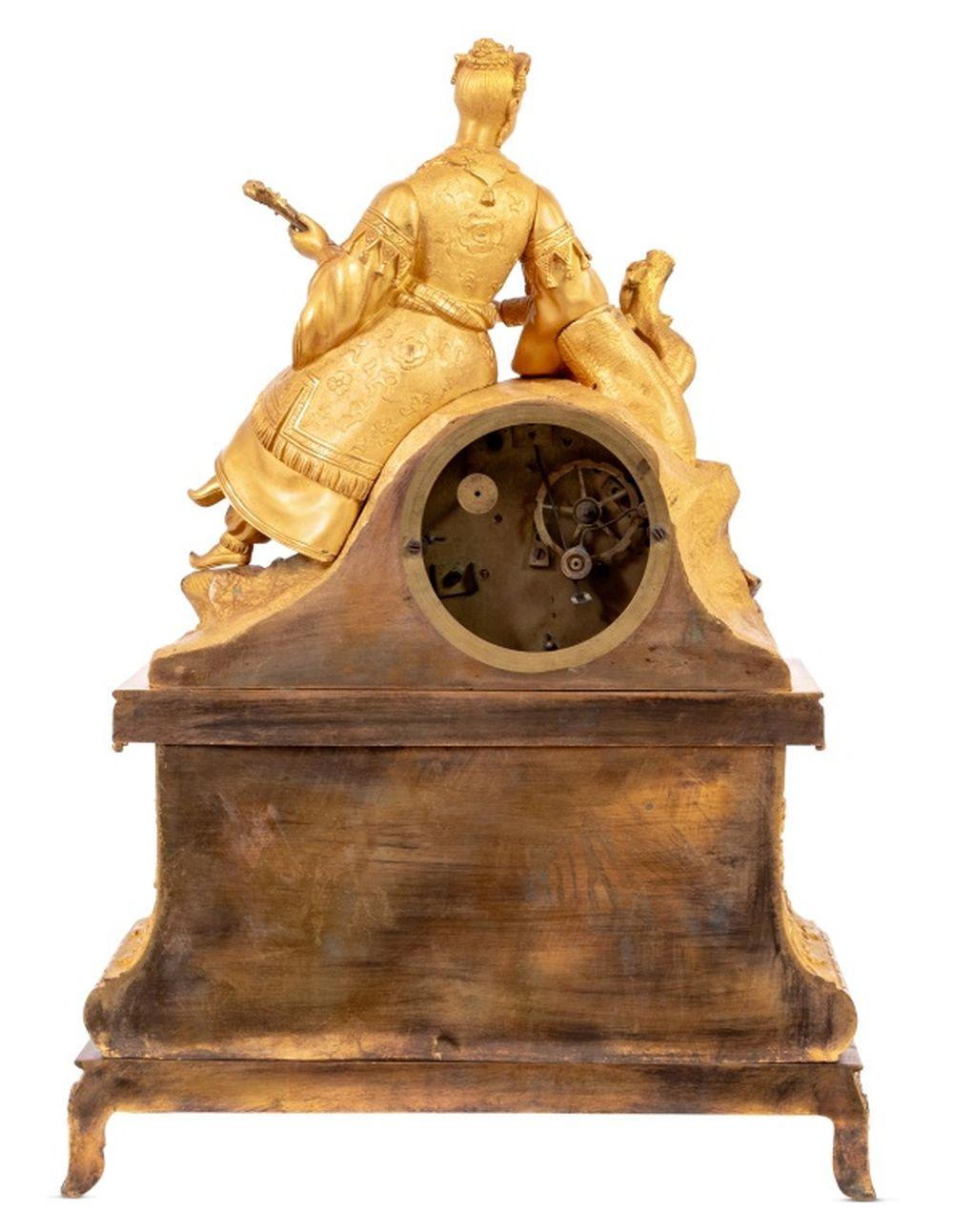 Mid-19th Century French Empire Gilt Metal Figural Clock For Sale