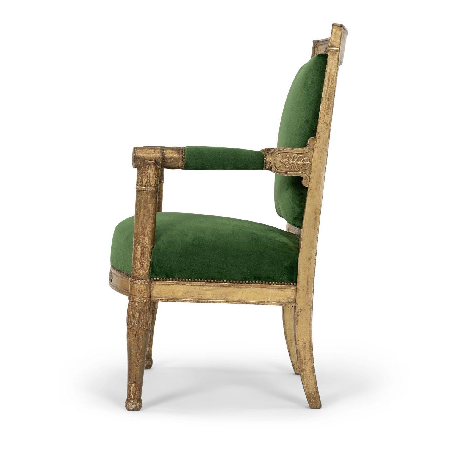 French Empire giltwood fauteuil armchair, circa 1815-1835, newly upholstered in grass-green velvet. Nice, large-scale proportions. Fine quality hand-carved detail. Acanthus and rosette decoration. Original gilt finish (in what appears to be both