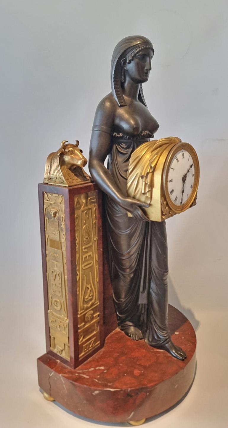 Patinated French Empire Gout d'Egypt Mantle Clock Depicting the Goddess Isis For Sale