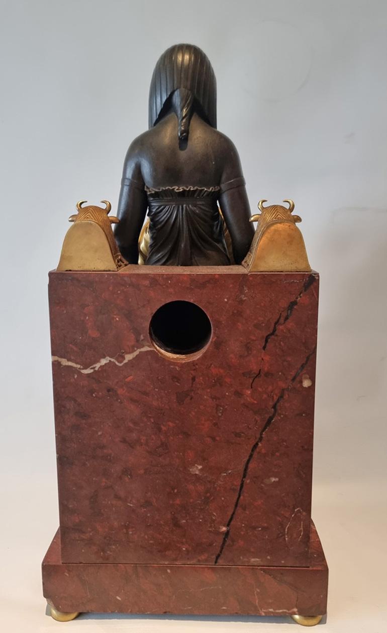 Early 19th Century French Empire Gout d'Egypt Mantle Clock Depicting the Goddess Isis For Sale