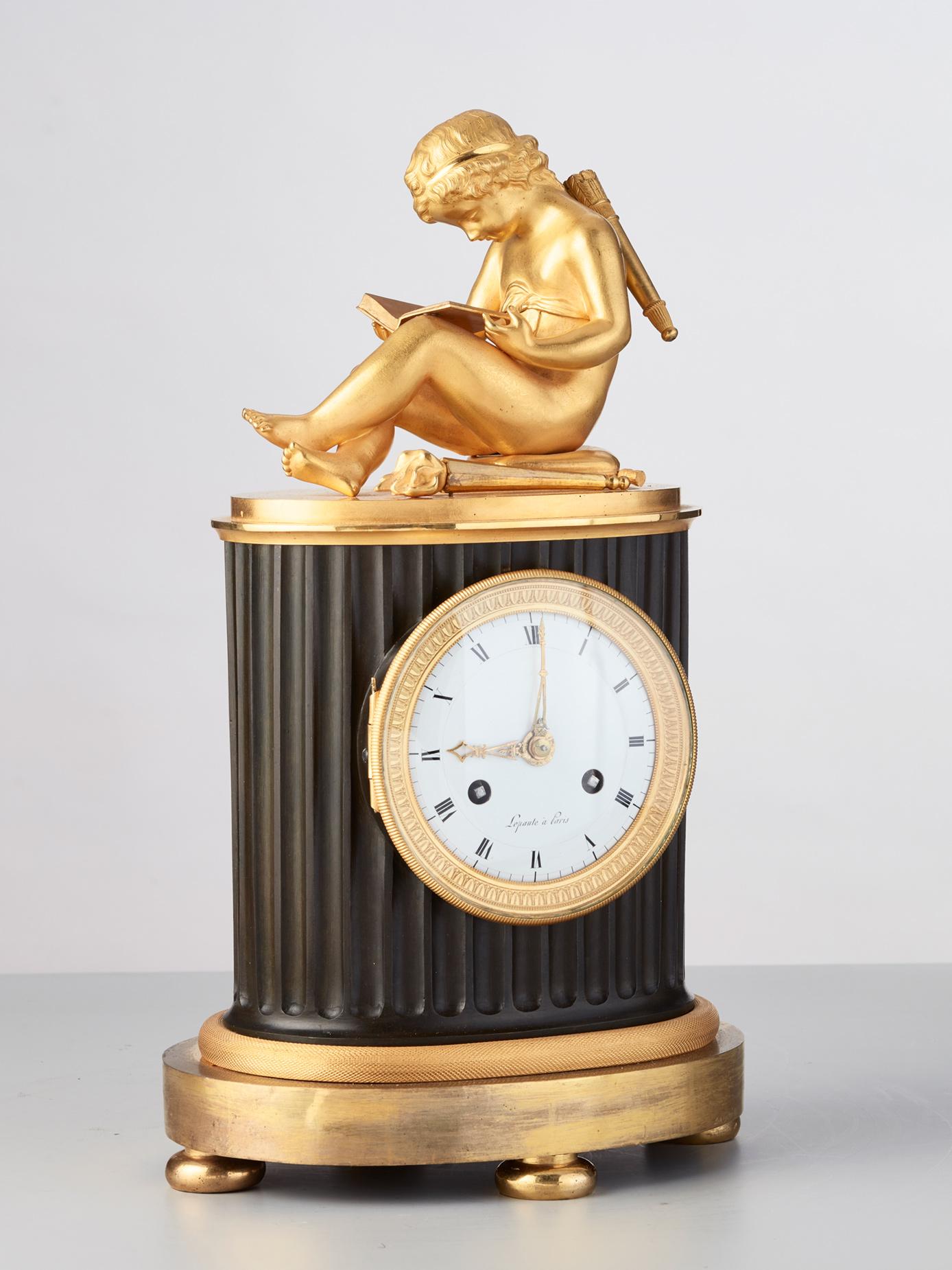 A charming Library Empire mantel clock. The Cupido reading the book is a very desirable  subject. Even now a good decoration in almost every interior . The striking count wheel 8-day movement on bell with silk threat suspension. The enamel dial with