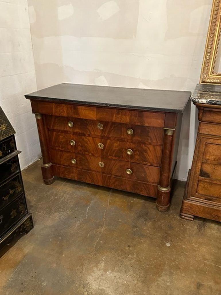 19th century French Empire Mahogany Commode with Belgian black marble top. Circa 1850. A fine addition to any home!