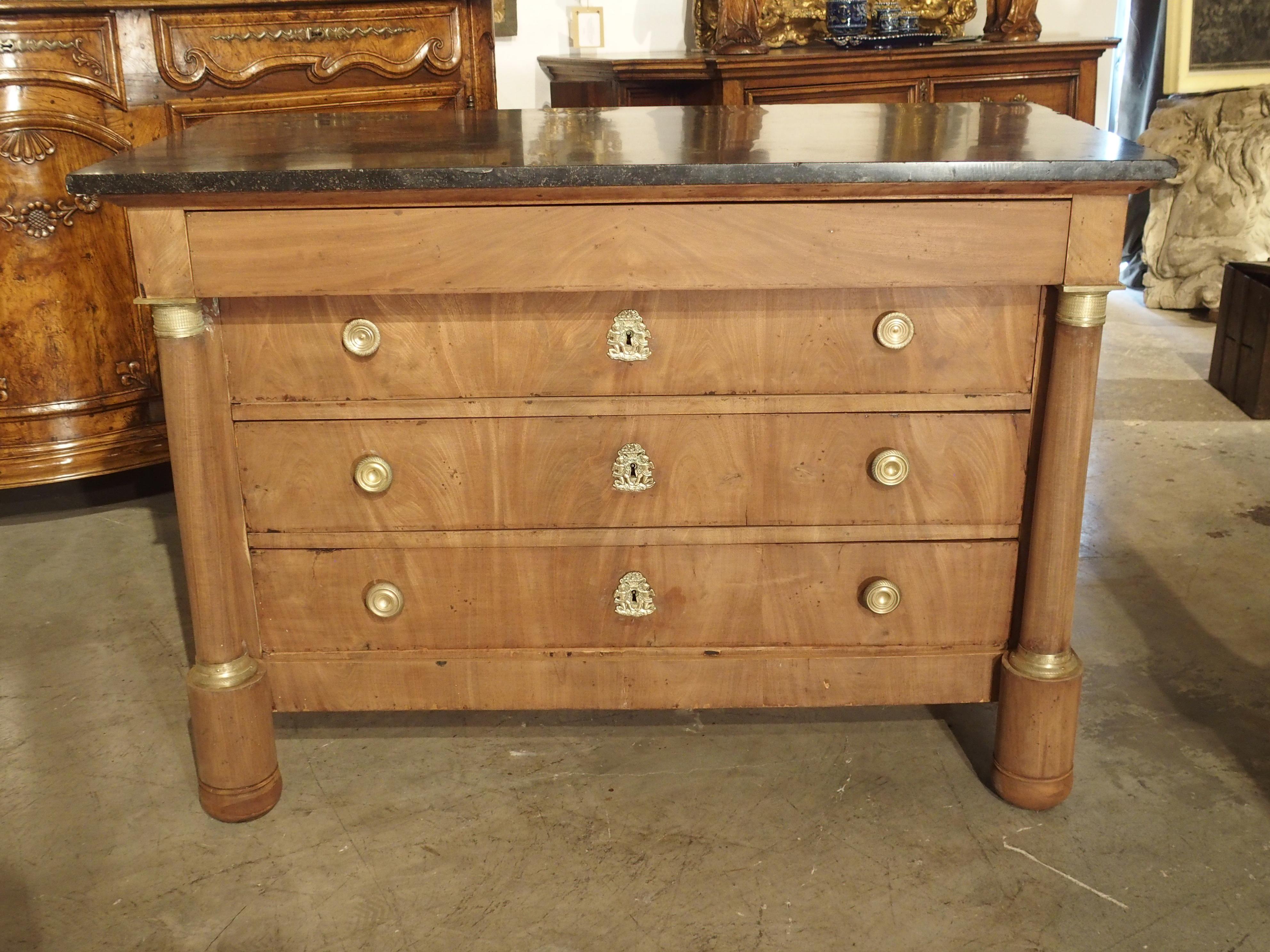 This French Empire commode is a perfect example of the type of chest of drawers that became popular in the early 1800s. This was a time when Napoleon preferred to do away with styles of the 18th century Monarchs. Influential designers commissioned