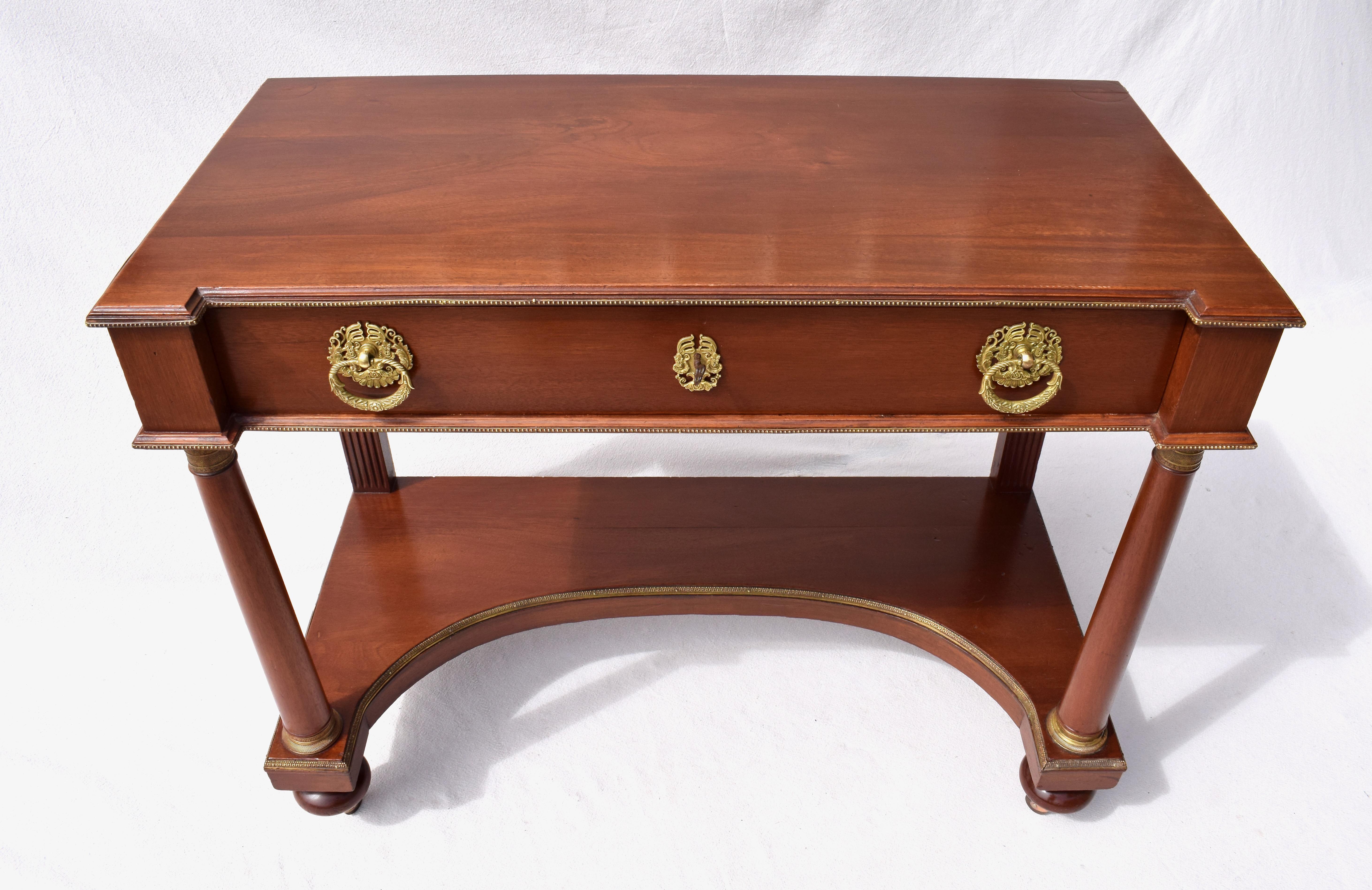 19th century French Empire single drawer console table with all original brass hardware, working lock & key embellished with brass beading throughout. An aesthetically pleasing multifunctional table.