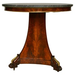 Guéridon ou table centrale en acajou de style Empire français  avec un plateau en marbre bleu turquin