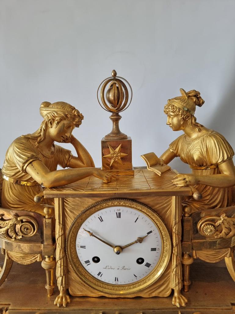 Ormolu French Empire mantel clock of the Astronomy Lesson by Jean-Andre Reiche For Sale