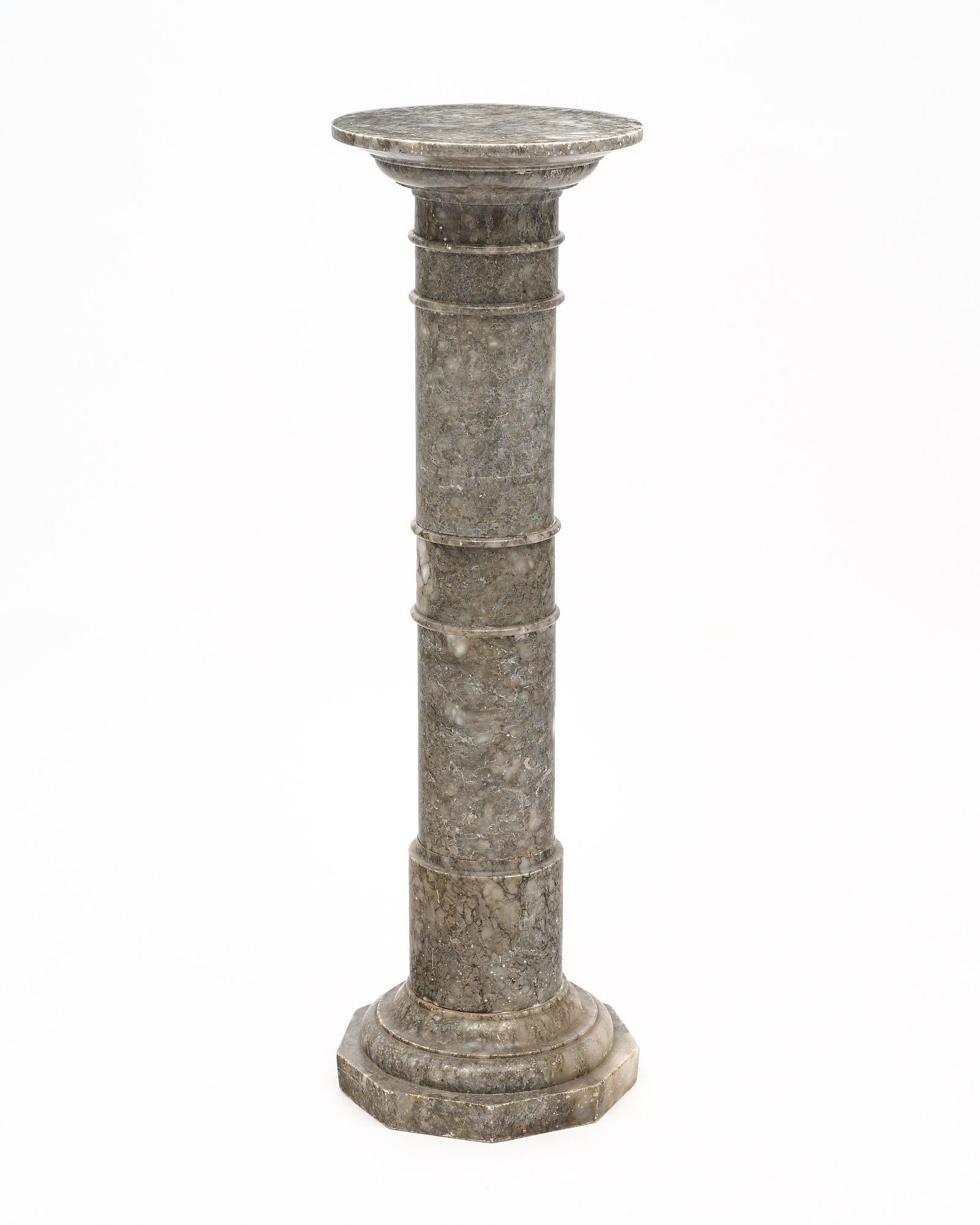 Marble column, French, from the Empire period. It is made of gray “Turquin” marble.
