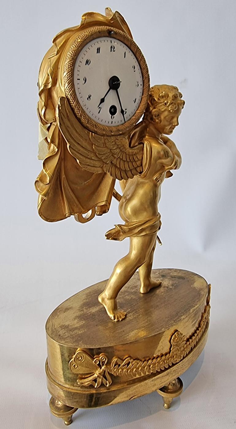 Early 19th Century French Empire Miniature Mantel Clock of Cupid Carrying Time