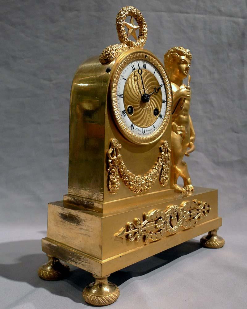 French Empire Miniature Ormolu Clock of Cupid Signed by Ledure and Thomas In Good Condition For Sale In London, GB