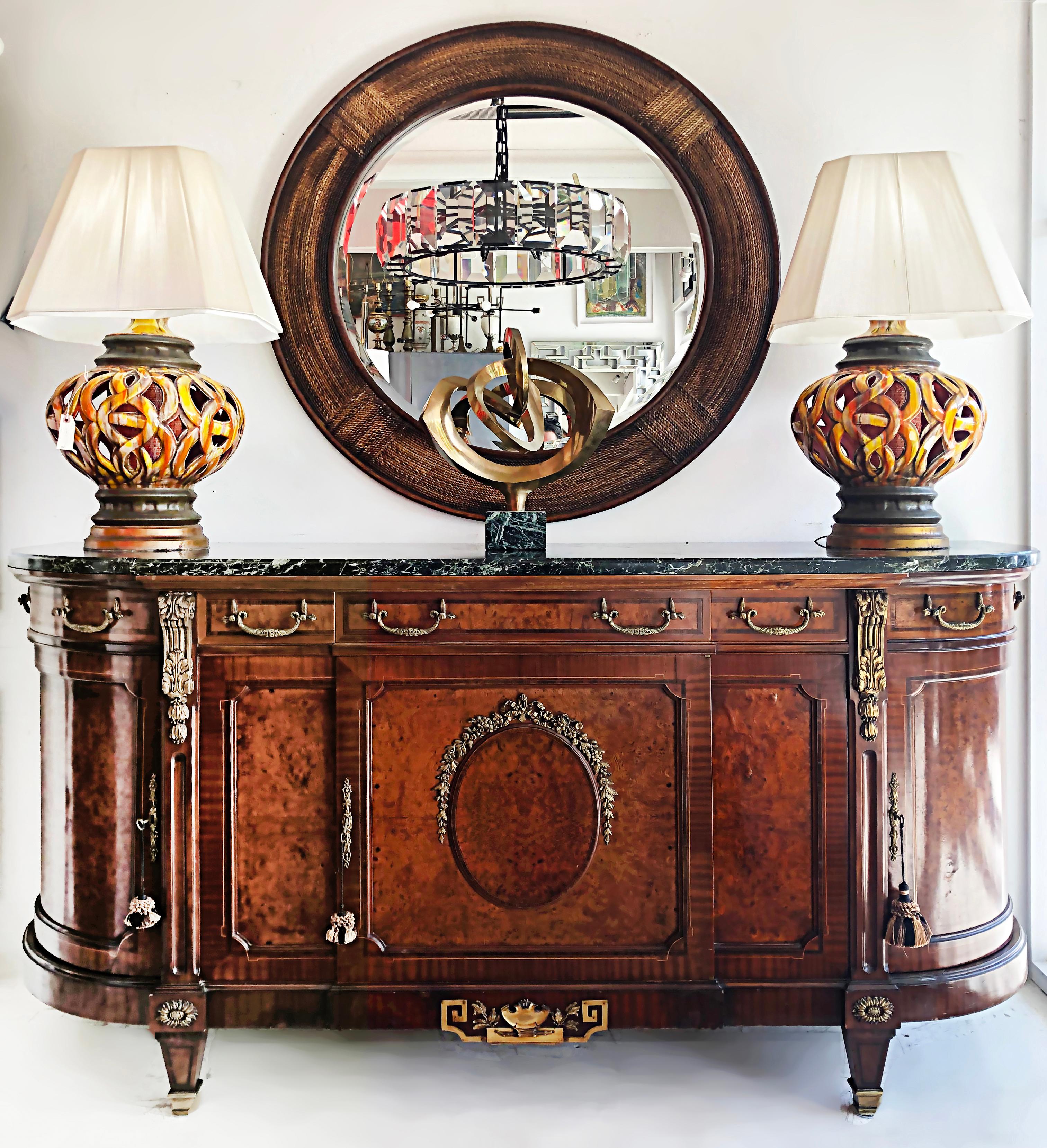 French Empire neoclassical burl Buffet, Marble, gilt bronze mounts

Offered for sale is a substantial turn of the last century antique French Empire Neoclassical-influenced buffet that is topped in marble and adorned with gilt bronze mounts. The
