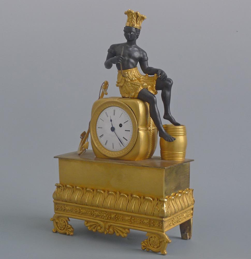 Patinated French Empire ormolu and bronze Pendule au Bon Sauvage clock signed Alibert For Sale
