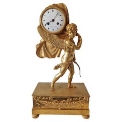 French Empire ormolu clock of Cupid carrying time by Le Roy Hr du Roi