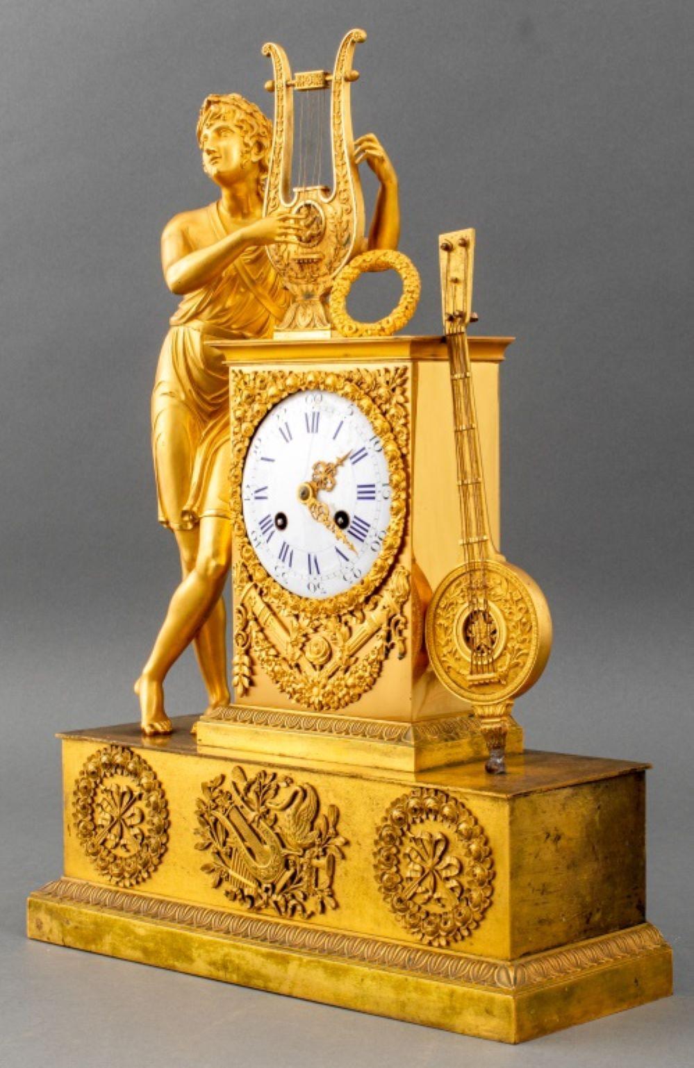 French Empire ormolu mantel clock, circa 1820, the case by Louis Stanislas Lenoir-Ravrio (French, 1783-1846), and depicting Apollo with his lyre by an altar, the dial with Roman numerals apparently unsigned, the later movement circa 1880 and signed