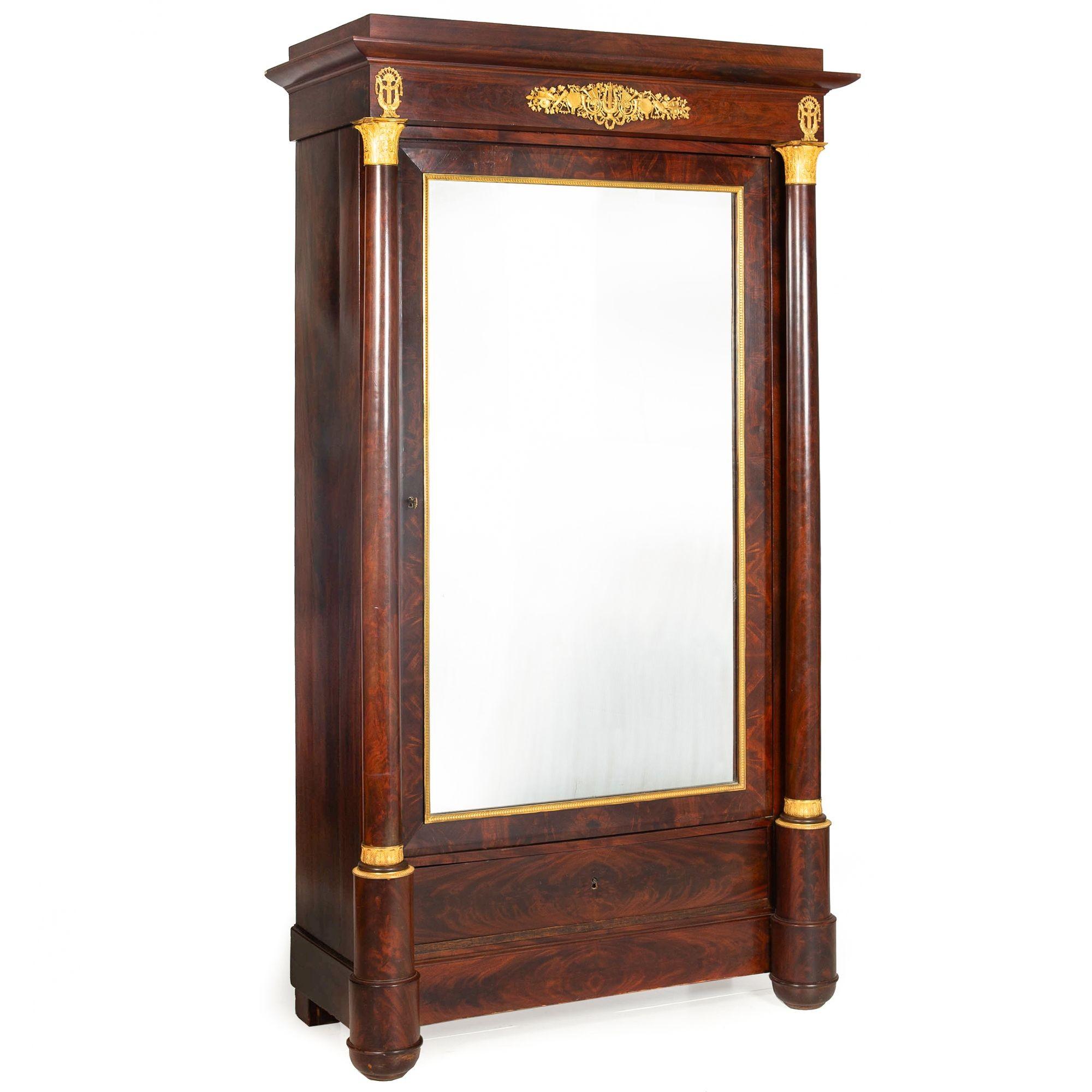 FRENCH EMPIRE MAHOGANY AND ORMOLU ARMOIRE
France, circa 1820–1840

85