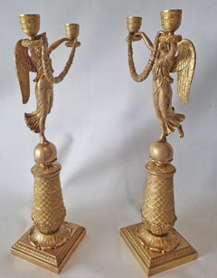 French Empire Pair of ormolu figural two branch candelabra