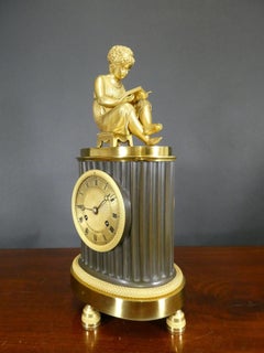 French Empire Patinated Bronze and Ormolu Mantel Clock