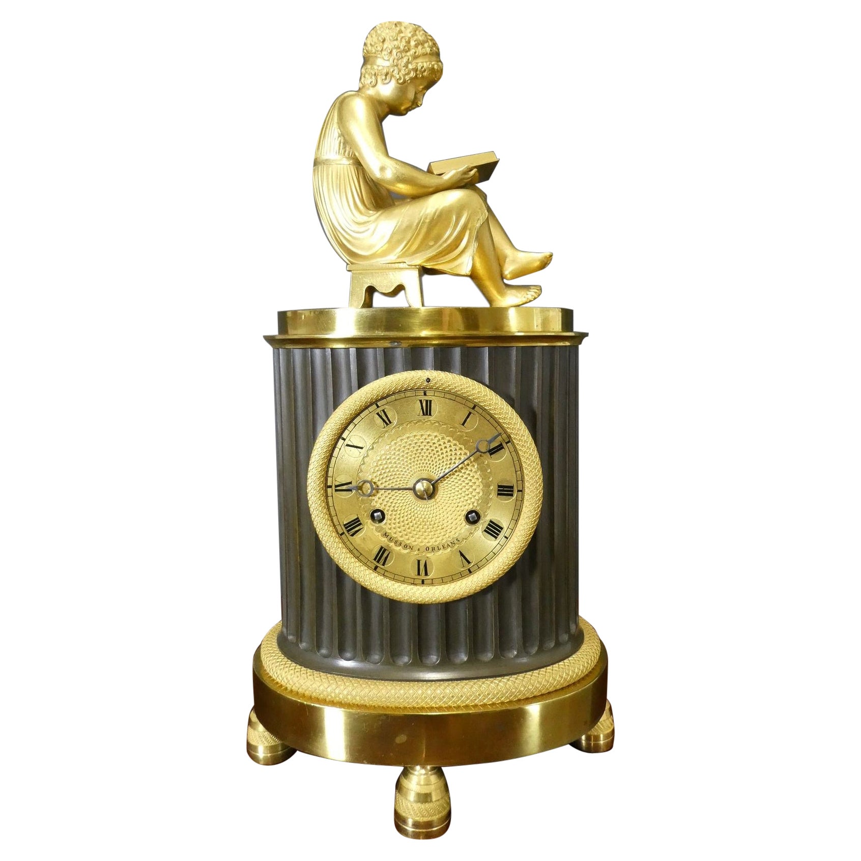 French Empire Patinated Bronze and Ormolu Mantel Clock
