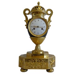 French Empire Patinated Bronze and Ormolu Vase Clock