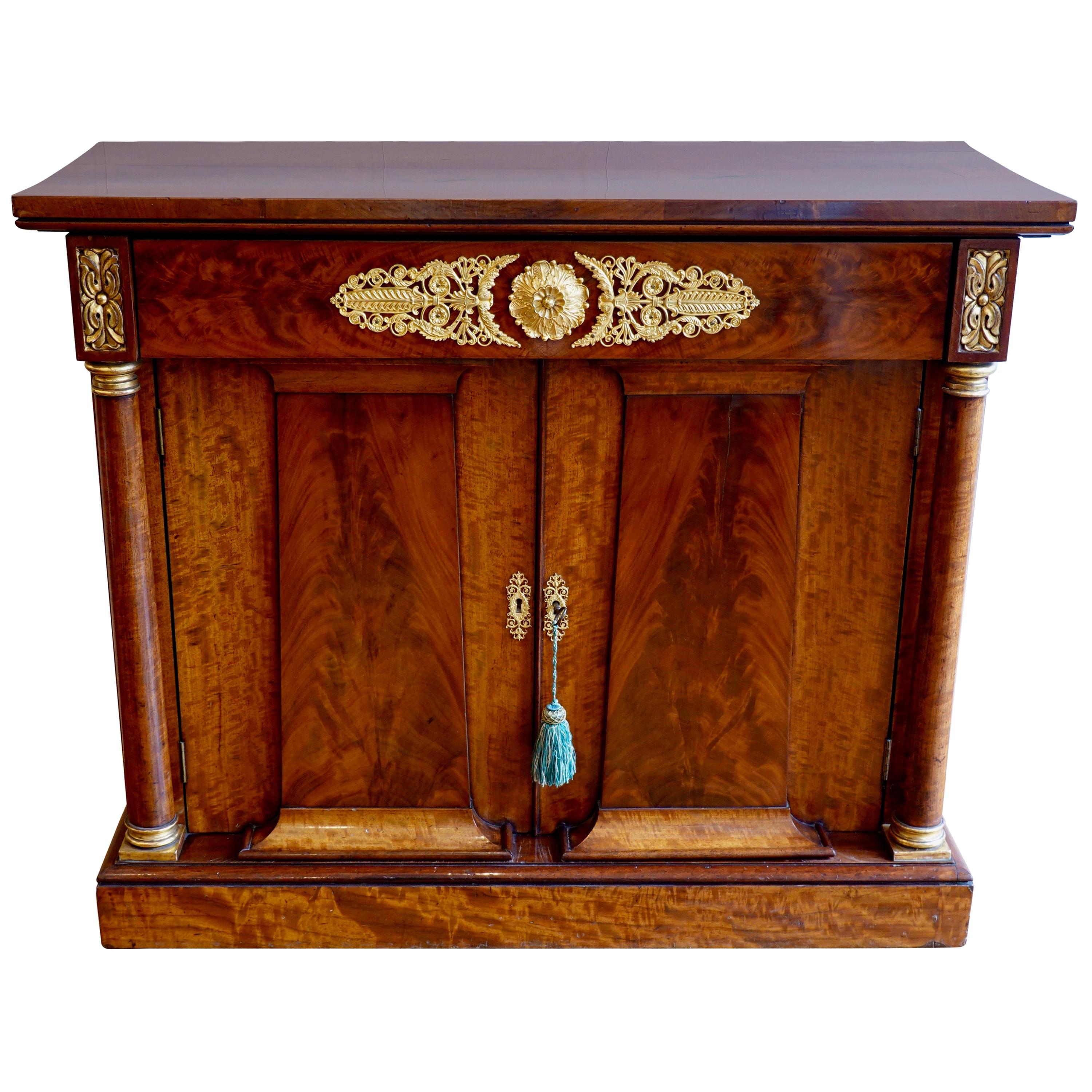 French Empire Period Flame Mahogany and Parcel-Gilt Cabinet