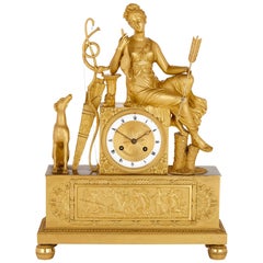 Horloge de cheminée en bronze doré d'époque Empire