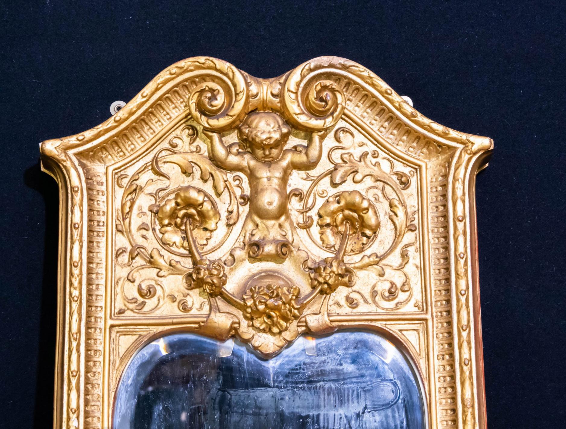 antique cherub mirror