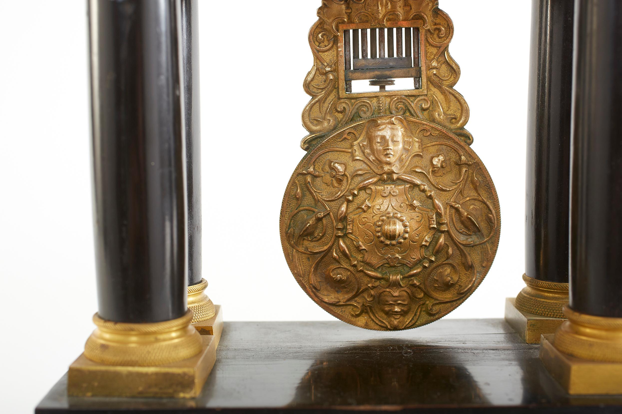 Mid-19th Century French Empire Portico Black / Bronze Table Clock