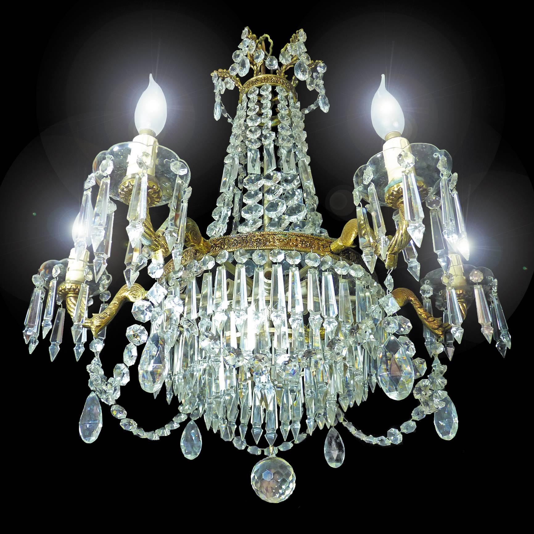 Stunning large French Empire cut crystal and bronze twelve-light chandelier with crystal drops and swags
Measures:
Diameter 26 in/ 66 cm
Height 45 in (32 in+ 13 in/chain) / 115 cm (70 cm + 35 cm/chain)
Weight 34 lb/15 Kg
Twelve light bulbs E14/ good
