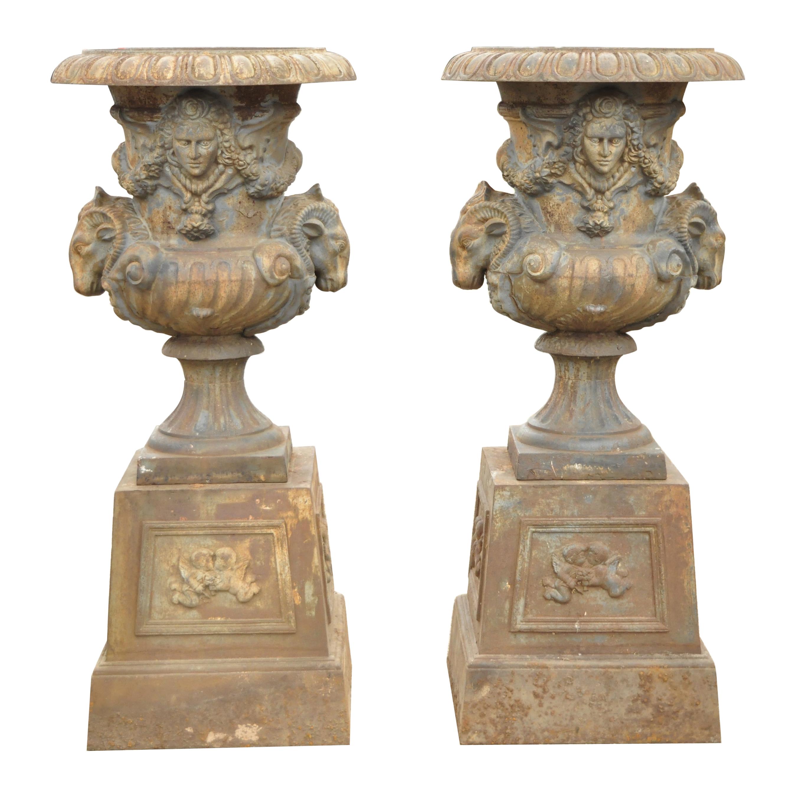 French Large Cast Iron Rams Head Garden Urn Planters, a Pair