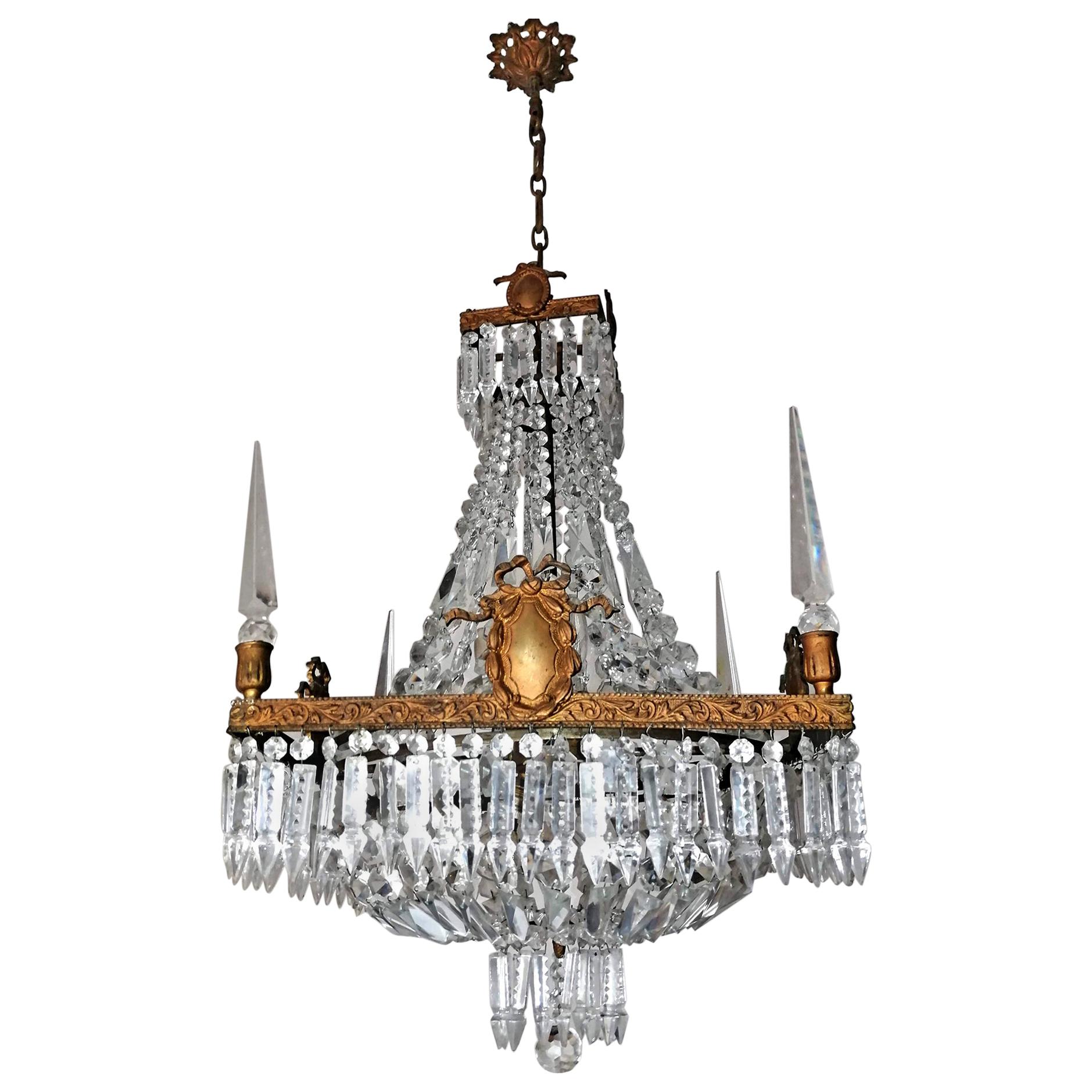 7-light French Empire pure crystal basket chandelier with gilt bronze frame and 4-faceted crystal obelisks, circa 1900s
Measures:
Depth, 17.7 in/ 45 cm
Width, 17.7 in/ 45 cm
Diameter 23.6 in/ 60 cm
Height 47.2in/ 11.8 in chain (120 cm /30 cm