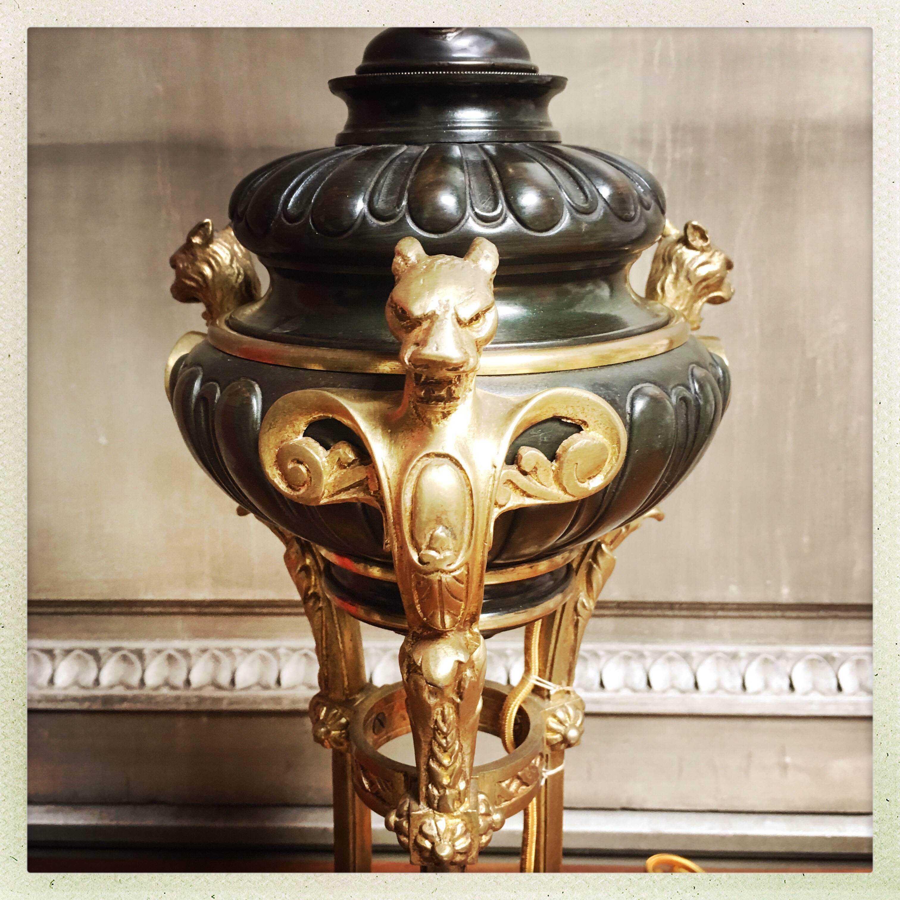 A French Empire Revival bronze lamp base with lioness motif.