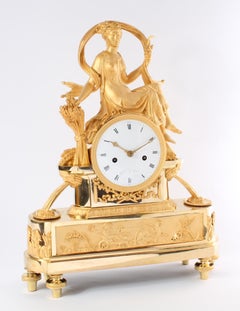 French Empire sculptural mantel clock by Colin à Paris