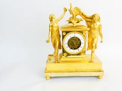 French Empire skeleton clock, fire-gilded, engraved bronze