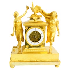 French Empire skeleton clock, fire-gilded, engraved bronze