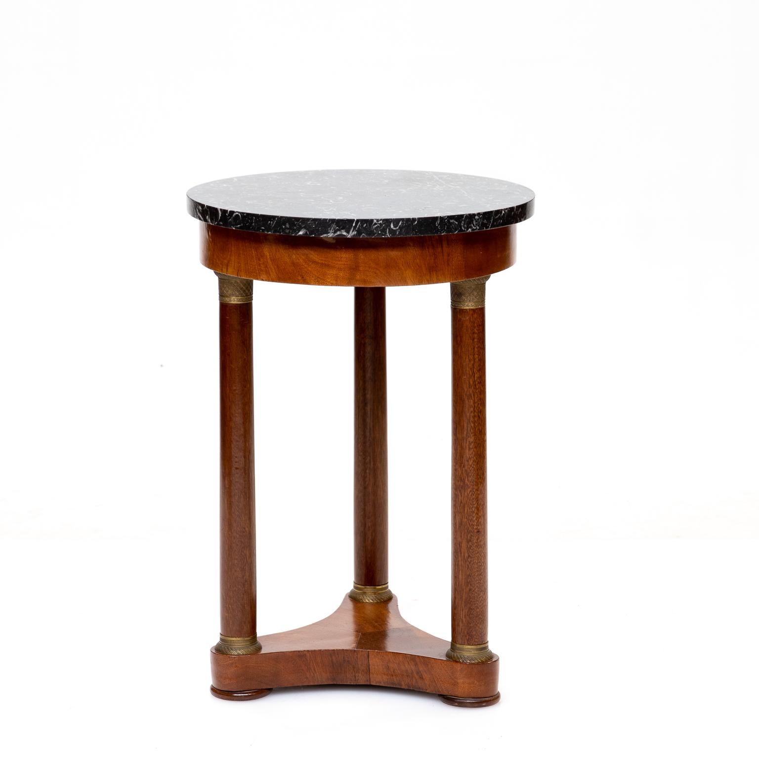 19th century French Empire marble top side table, small in size. Mahogany with bronze mounts. Very nice quality piece.