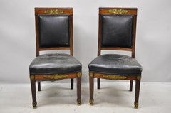 French Empire Solid Mahogany Regency Side Chairs Figural Bronze Ormolu, a Pair