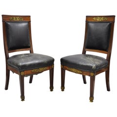 Antique French Empire Solid Mahogany Regency Side Chairs Figural Bronze Ormolu, a Pair