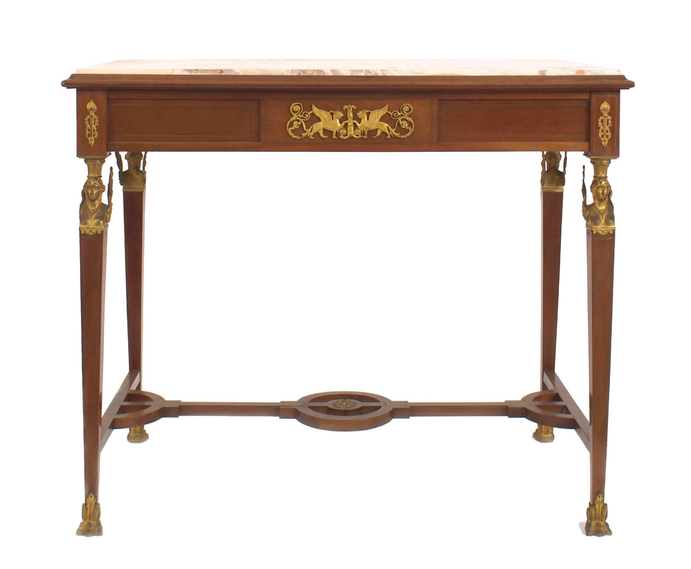 French Empire style (19th centntury) mahogany and bronze trimmed rectangular centre table with winged females, open stretcher and onyx top.