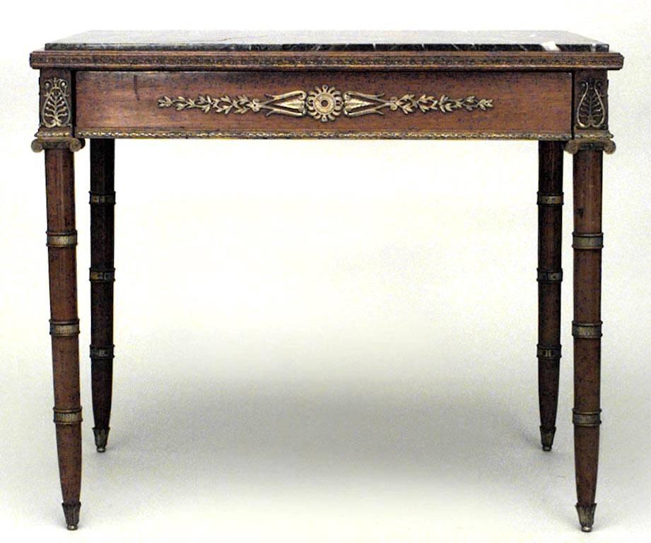 French Empire style (19th century) mahogany and bronze trimmed table with single drawer and green (repaired) marble-top.
  