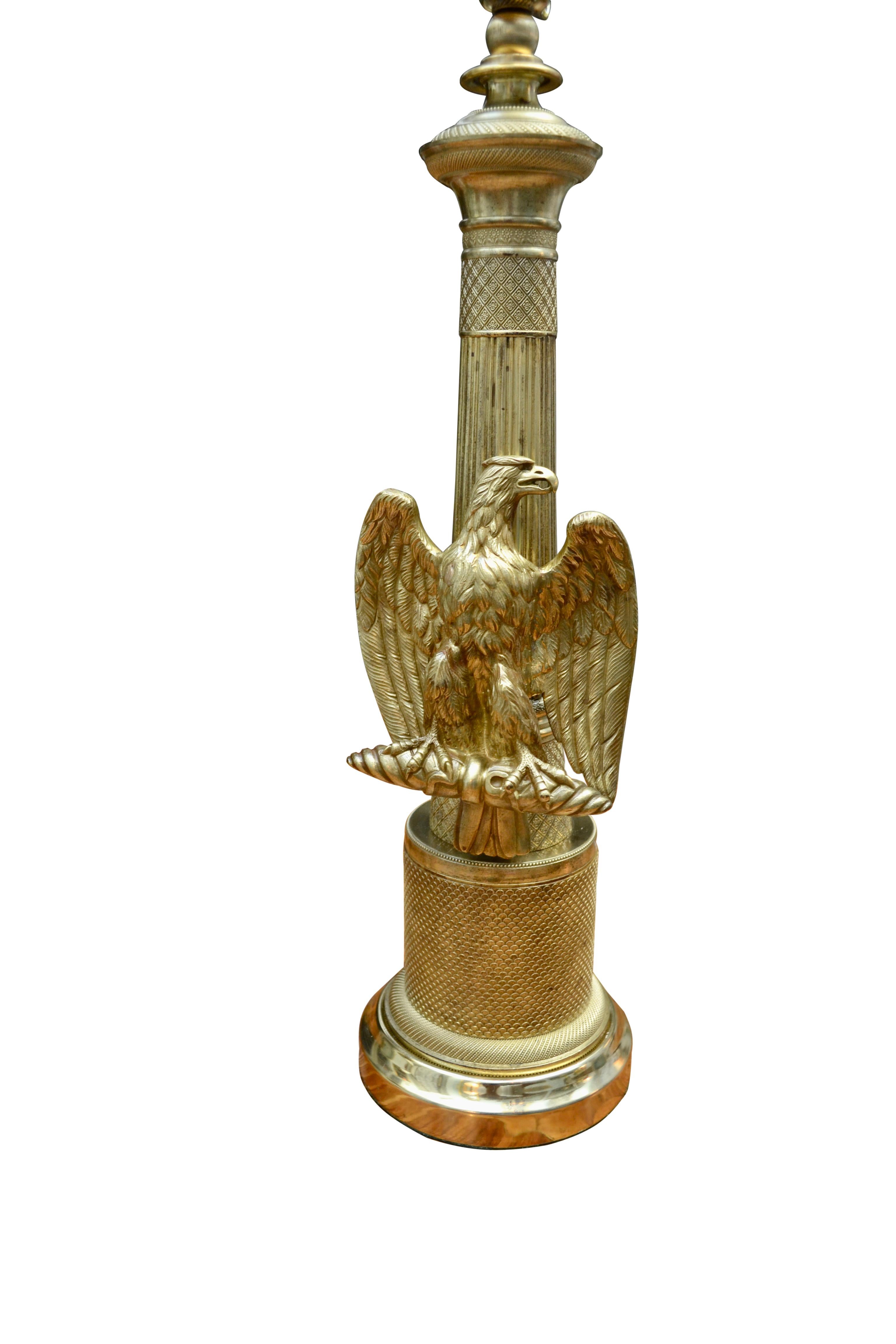 Polished French Empire style Brass Column Lamp with an Eagle For Sale