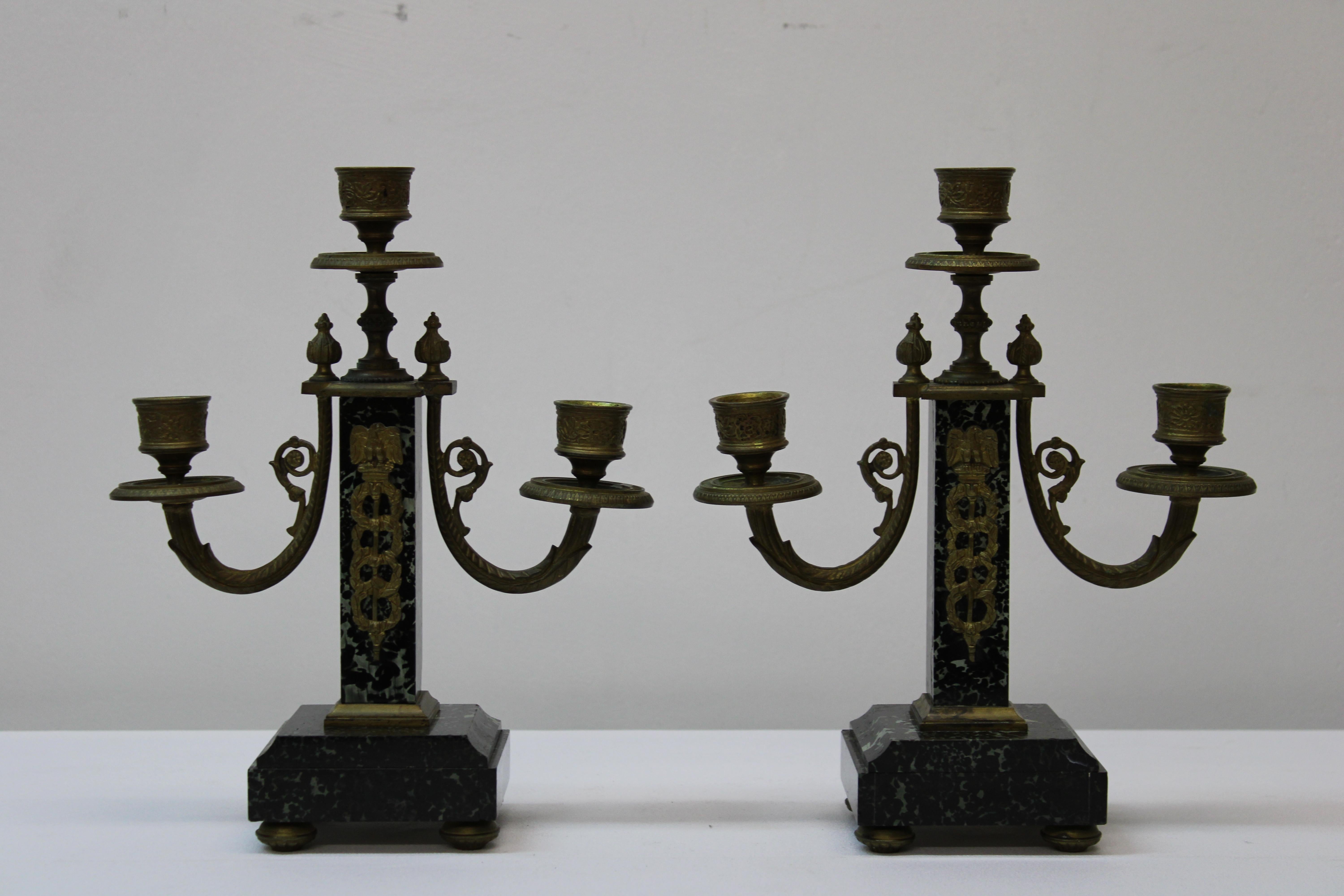 C. 19th century

French empire style brass & marble candelabra's.