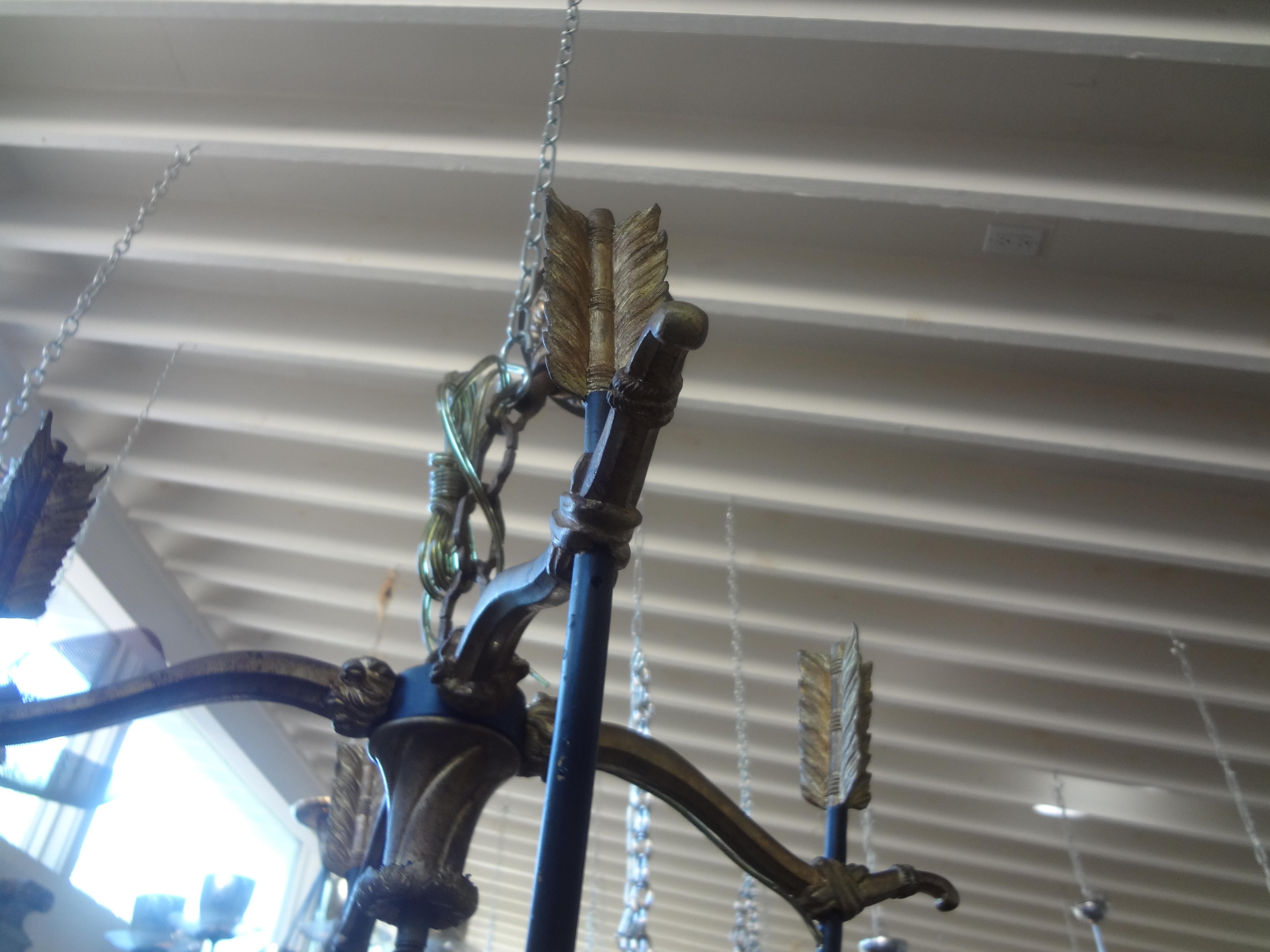 Early 20th Century French Empire Style Bronze Chandelier With Arrows For Sale