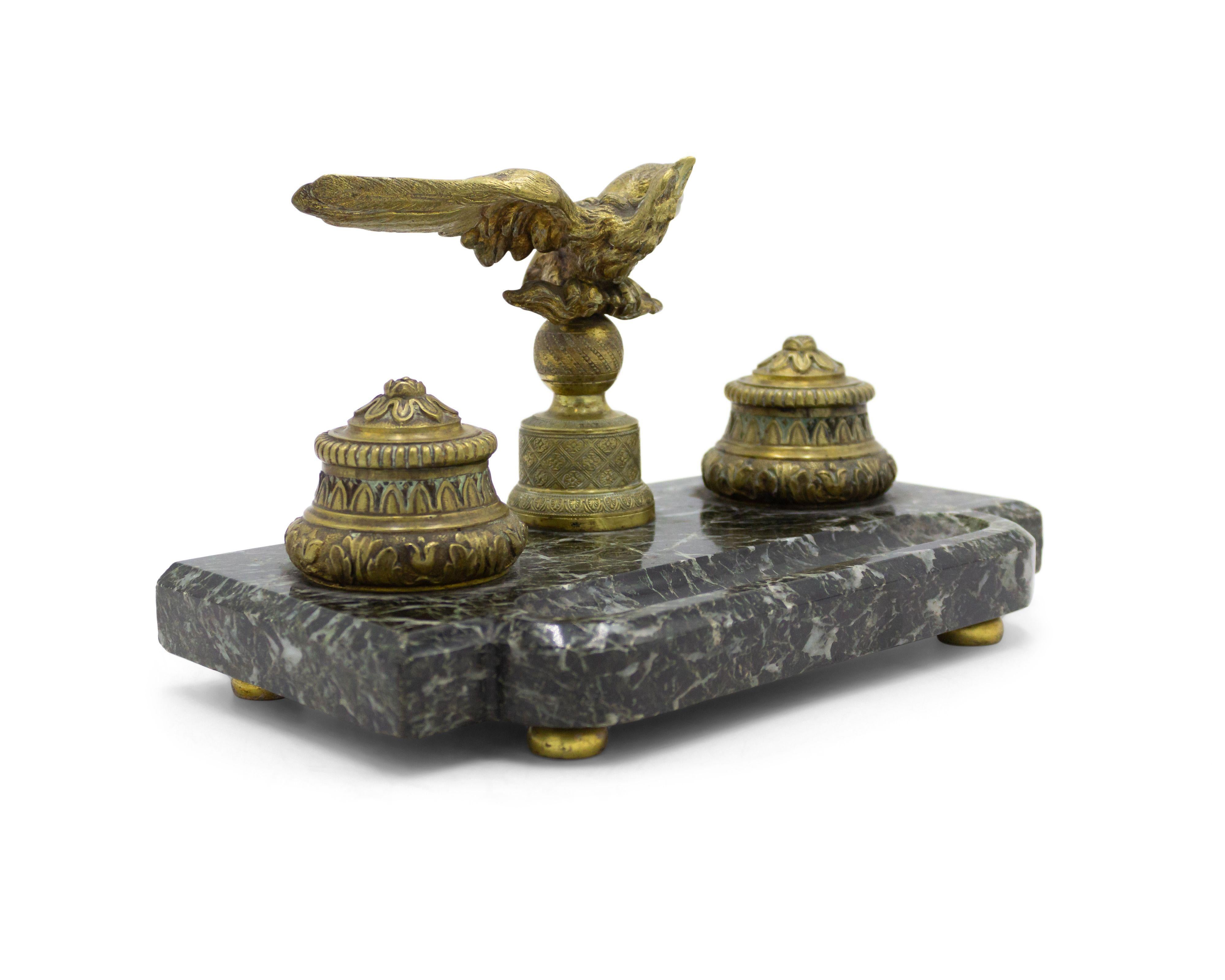 French Empire-style (19th Century) bronze double inkwell with eagle on top and rectangular green marble base.
