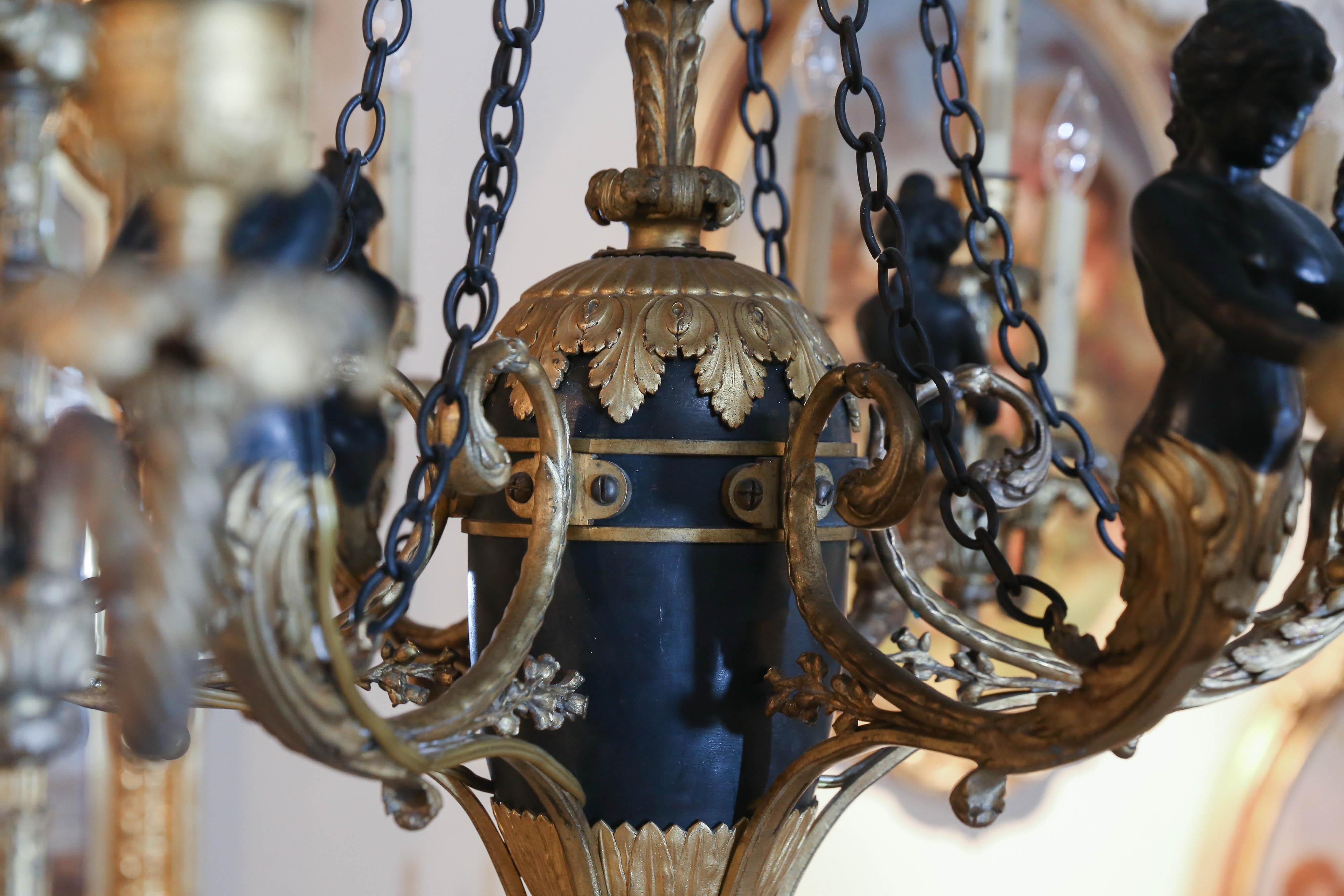 Early 20th Century French Empire Style Cast Bronze Doré and Patinated Frame Chandelier, 24 Lights For Sale